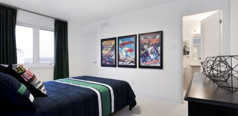 Second bedroom with carpeted flooring, a walk-in closet, and a 3-piece ensuite bathroom.