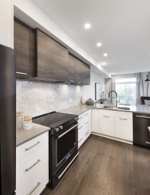 Well-lit kitchen with plenty of storage space.