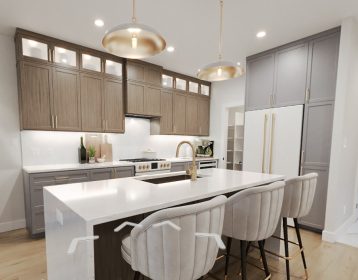 Kitchen with island, cabinets to the ceiling and a walk-in pantry.